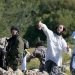 Israeli settlers throw stones at vehicles near Nablus 18 Israeli settlers throw stones at vehicles near Nablus