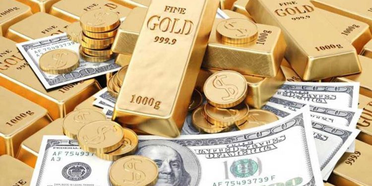 Gold falls, dollar to highest level in two years