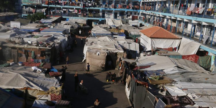 Palestinian families who fled their homes due to Israeli attacks and took refuge in a school belonging to the United Nations Relief and Works Agency for Palestine Refugees in the Near East (UNRWA) in the city are viewed living under difficult conditions, in Deir Al Balah, Gaza on July 11, 2024. The humanitarian crisis in the region is deepening due to the months-long Israeli attacks against Gaza. Photo by Omar Ashtawy apaimages